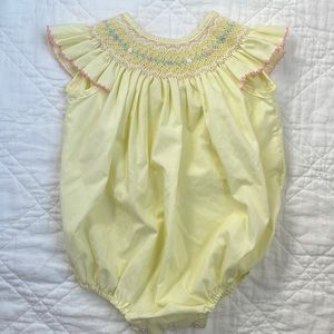 Petit Bebe smocked bubble size 9m